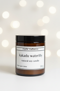 Kakadu Waterlily Amber Jar Candle – Pastel Cream Bokeh