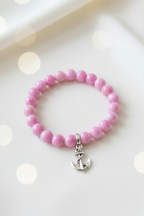 Pink Anchor Charm Bracelet – Pastel Cream Bokeh
