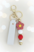 Red Checkered Flower Keychain – Pastel Cream Bokeh